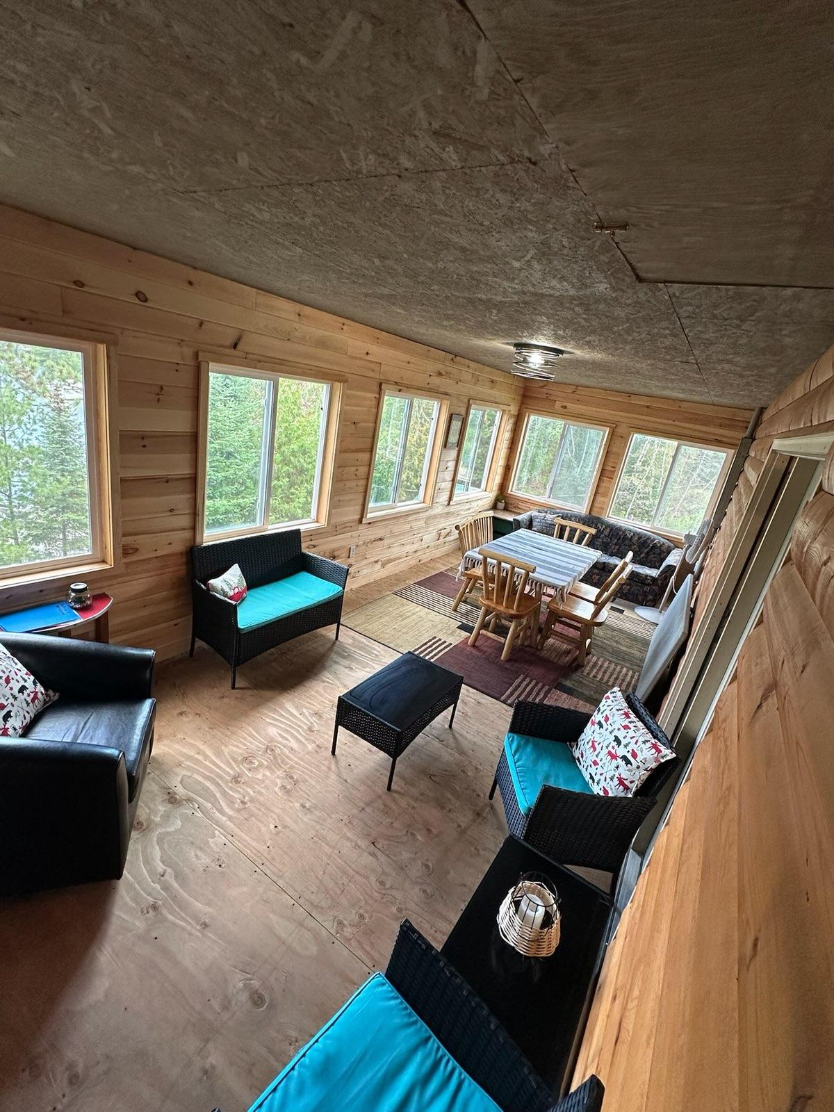 Screened-in porch with lake-view windows